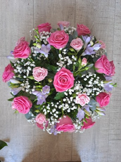 Rose & Scented Freesia - Pink & Lilac - Roses and scented freesia in pink's and lilac are nestled amongst choice foliage in this classic posy design.