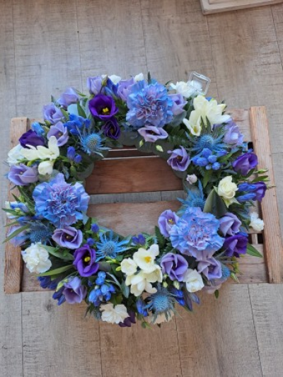 Classic Wreath - Blue & White - A classic selection of flowers in blues and whites in this traditional wreath.
