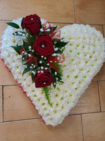 Funeral Heart - At Daisy Chain Flowers we are delighted to present this heart tribute available for flower delivery in Warrington and surrounding areas.
